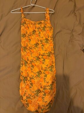 Urban outfitters Yellow Floral Mini Dress with Green Accents. New with tags